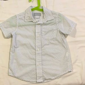 White with blue and green designs,